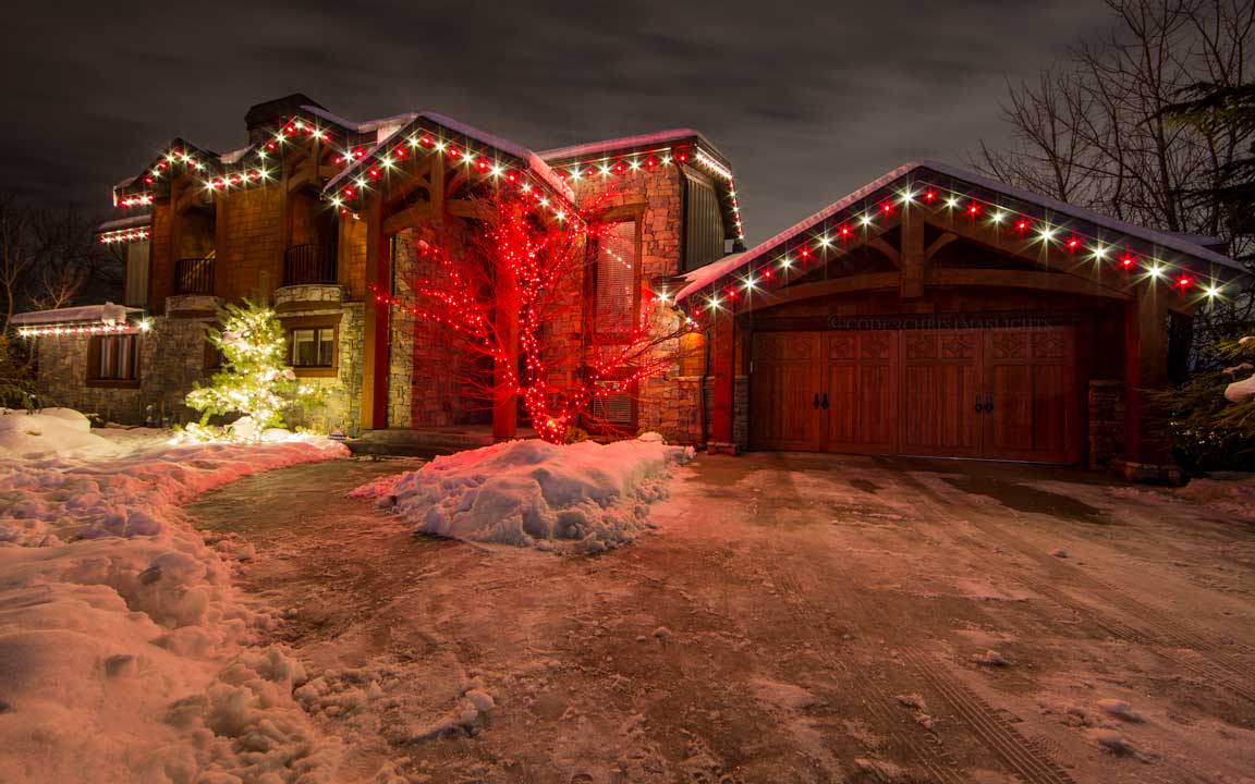 Snowy-House-Decorated-With-Sharp-Red-And-White-Lights
